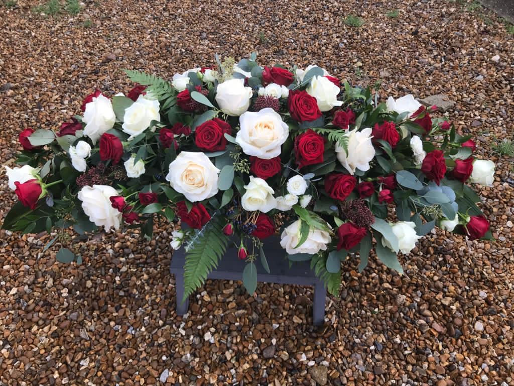 Red and Cream Winter Berry Coffin Spray